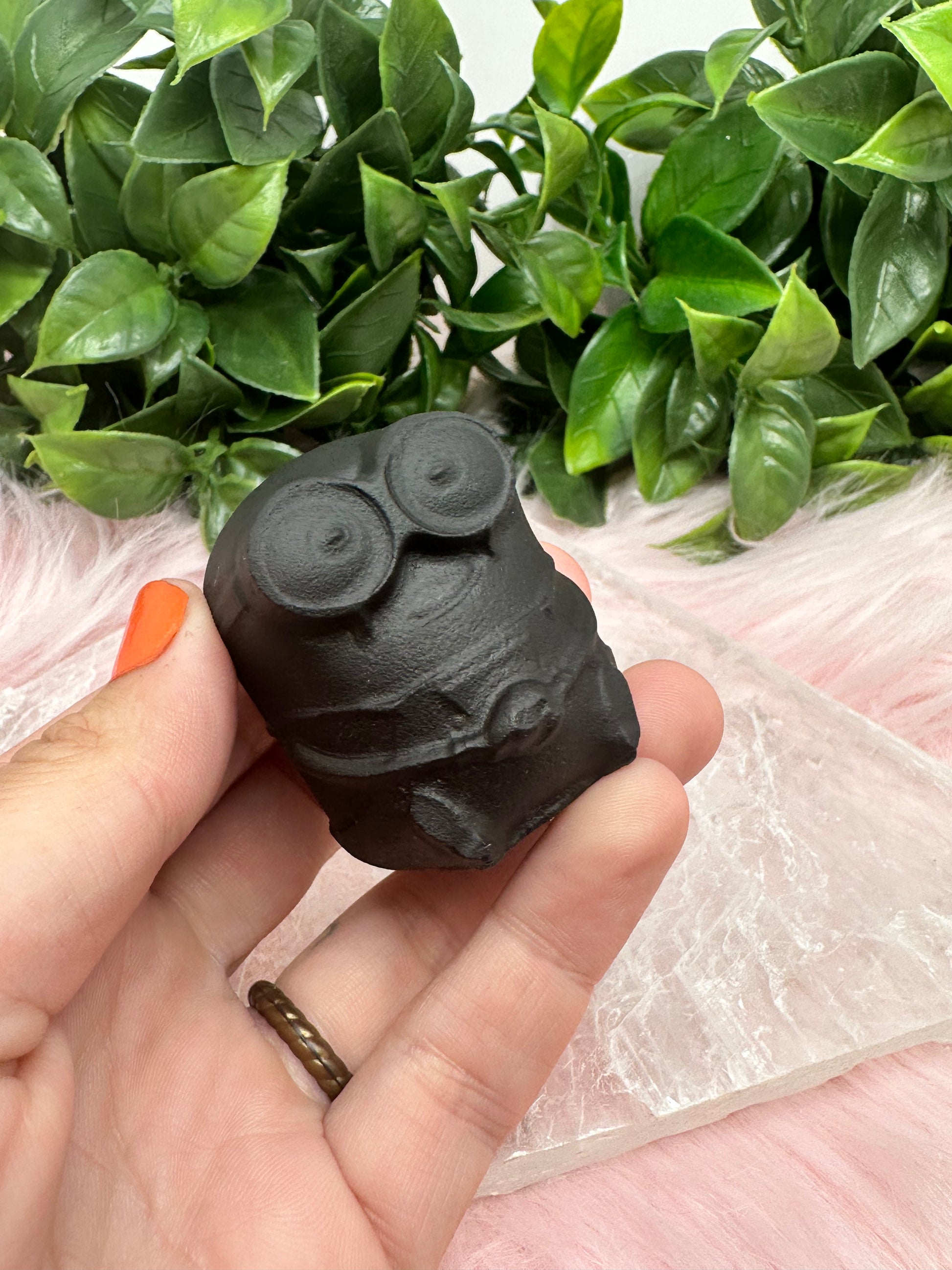 black obsidian minion carving