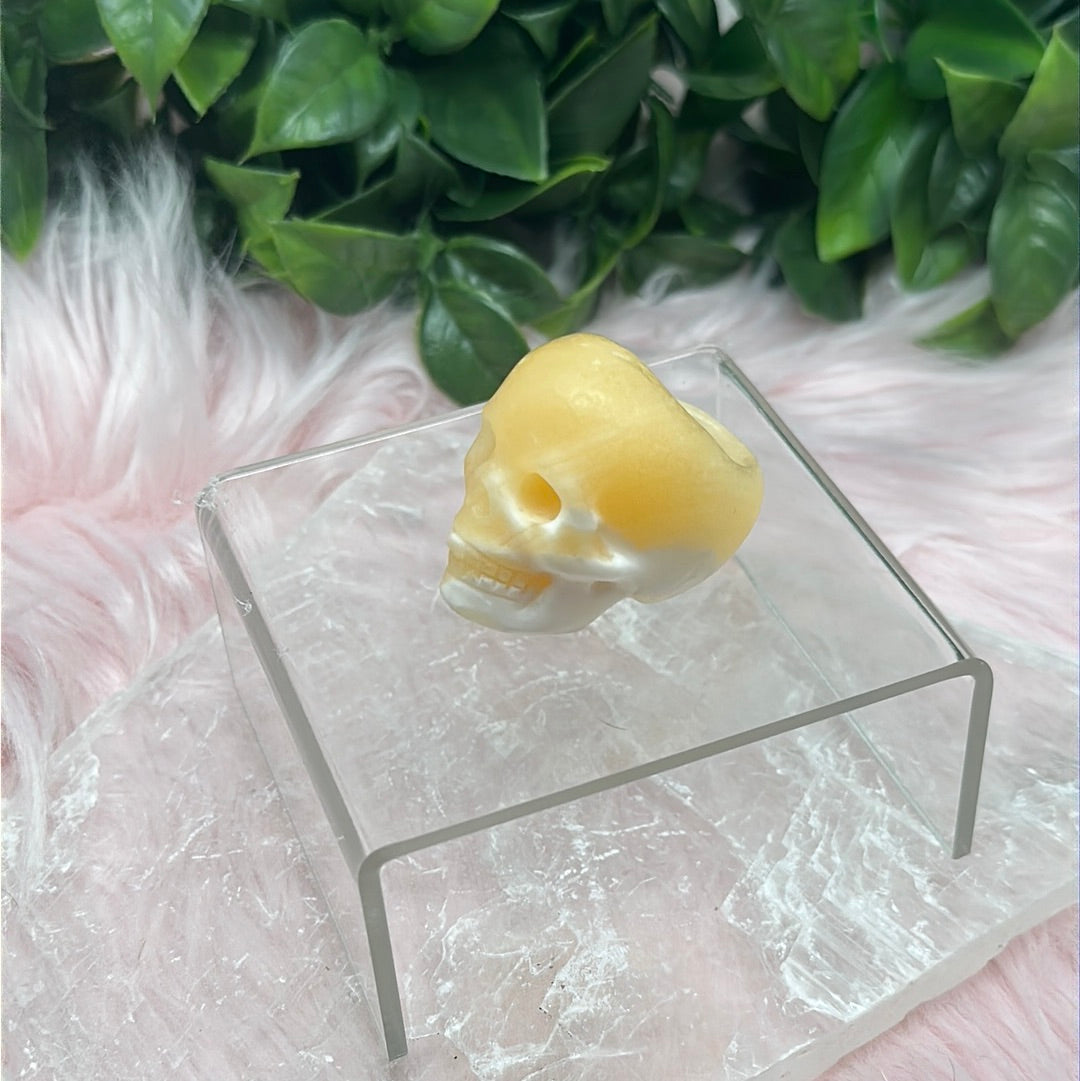 orange calcite skull rings