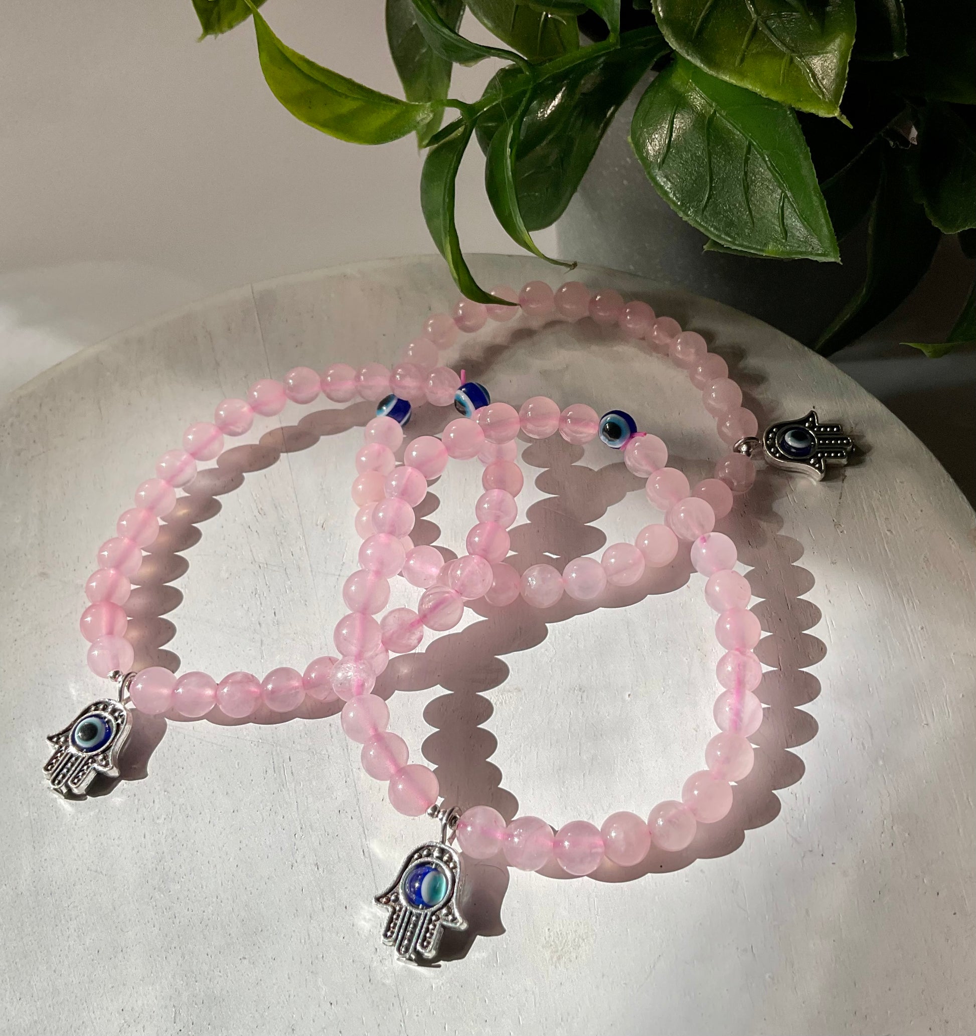 Evil eye hamsa rose quartz bracelet